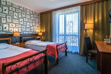 Фото номера Семейный номер Делюкс Отель Hotel Strzelnica г. Kochcice 3