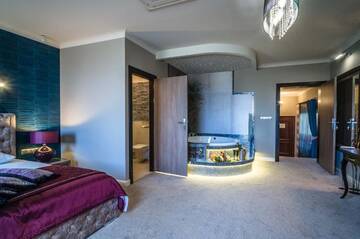Фото номера Улучшенный двухместный номер с 1 кроватью Отель Hotel Strzelnica г. Kochcice 15